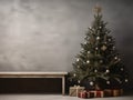 A christmas tree with ornaments and presents in front of a grey wall. Copy space, place for text