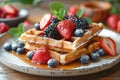 Embrace a luxurious morning with waffles that meld the tartness of berries with sweetness