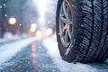 Winter Resilience: Close-up of Snow Tires on a Snowy Mountain Road (AI Generated)