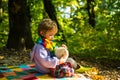 Embraces copncept. Baby boy playing with teddy. Child concept. Small boy enjoy childhood years. Every childhood matters Royalty Free Stock Photo