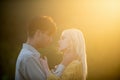 Embraces of a loving couple. Portrait of lovely couple in love. Young sensual girlfriend glad to passionate kiss from Royalty Free Stock Photo