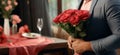 Embracing the romantic surprise, a man presents a bouquet of beautiful roses