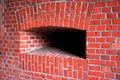 Embrasure in the brick fortress wall, the old fortress Royalty Free Stock Photo