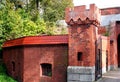 Embrasure in the brick fortress wall, part of the tower, the old fortress