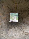 Embrasure in a castle wall Royalty Free Stock Photo