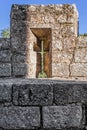 Embrasure in a merlon of the battlement at the Feira Castle walls. Royalty Free Stock Photo