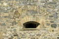 Embrasure in the wall a fortress Royalty Free Stock Photo