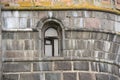 Window in medevial castle wall. Recessed frame window in old stone wall Royalty Free Stock Photo