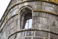 Window in medevial castle wall. Recessed frame window in old stone wall Royalty Free Stock Photo