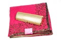 Embroided pink saree with golden purse