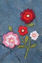 Embroider flower on jeans