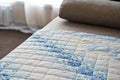 Embroidered by dark blue and white patterns a scrappy blanket 2993.