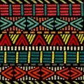 Embroidered ethnic seamless pattern. Aztec and tribal motifs. Striped ornament hand drawn. Print in the bohemian style. Vector Royalty Free Stock Photo