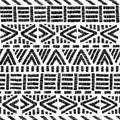 Embroidered ethnic seamless pattern. Aztec and tribal motifs. Striped ornament hand drawn. Print in the bohemian style. Vector Royalty Free Stock Photo