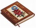 Embroidered Floral Pattern Brown Leather Bound Journal on a White Background Royalty Free Stock Photo