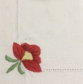 Embroidered flower on an old tablecloth Royalty Free Stock Photo