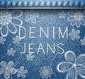 Embroidered flower pattern on denim jean texture