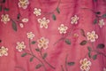 Embroidered Flowers on Pink Silk Royalty Free Stock Photo