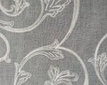 Embroidered Flowers on Sheer White Fabric