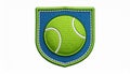 Embroidered Green Tennis Ball on Blue Shield Patch Isolated on White Background Royalty Free Stock Photo