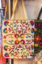 Embroidered handbag for sale at a market in Srinagar