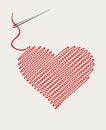 Embroidered heart with a needle thread Royalty Free Stock Photo