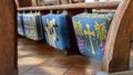 Embroidered Kneelers Prayer Cushions Hanging From Church Bench Royalty Free Stock Photo