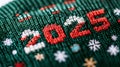 2025 Embroidered on a Knitted Green Christmas Sweater Royalty Free Stock Photo