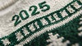 2025 Embroidered on a Knitted Green Christmas Sweater Royalty Free Stock Photo