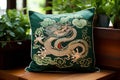 Embroidered pillow with an emerald green dragon image in interior. Symbol of the year 2024