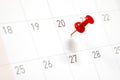 Embroidered red pins on a calendar on the 20th Royalty Free Stock Photo