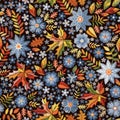Embroidered seamless pattern wAith blue flowers and colorful leaves on black background. Beautiful floral embroidery Royalty Free Stock Photo
