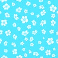 Embroidered white flowers on blue background