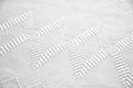 Embroidered white towel with geometric shapes Royalty Free Stock Photo