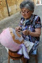 Embroiderer with craft wires in the city of Offida in Central It