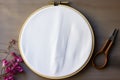 Embroidery base White fabric secured in a round wooden frame