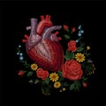 Embroidery crewel human anatomical heart medicine organ flower rose blooming. Red stitch embroidered design texture