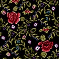 Embroidery ethnic seamless pattern with simplify red roses and rowanberry.