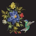 Embroidery fashion pattern with hummingbird and exotic flowers.