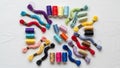 Embroidery floss and spools of thread arranged in a circular Royalty Free Stock Photo