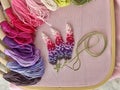 embroidery of flowers in French knot technic, canvas