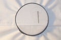 Embroidery hoop with running stitch and needle on