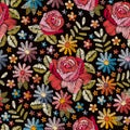 Embroidery seamless pattern with beautiful colorful flowers. Floral background in vintage style.