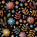 Embroidery seamless pattern with colorful flowers and leaves on black background. Bright floral design Royalty Free Stock Photo