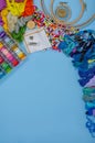 Embroidery threads and tools for handmade. Embroidery accessories on the table Royalty Free Stock Photo