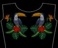 Embroidery toucan with tropical flowers for