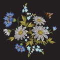 Embroidery trend floral pattern with chamomiles, cornflowers and bee. Royalty Free Stock Photo