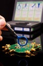 EMC engineer analyzing PCB using near-field probe Royalty Free Stock Photo