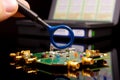EMC engineer analyzing PCB using near-field probe Royalty Free Stock Photo