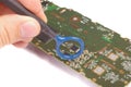 EMC engineer analyzing PCB using near-field probe Royalty Free Stock Photo